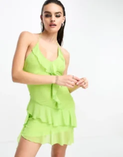 Glamorous Halter Neck Mesh Mini Dress With Asymmetric Hem Detail In Lime